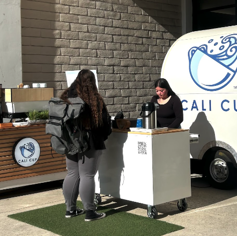 CaliCup employee Bryhanna Alcazar serves a quick pick-me-up to student Becky Carnero on Jan. 21, 2025. 
